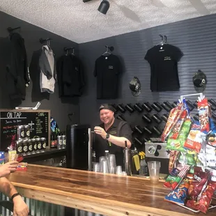 Justin, the owner, behind the bar.