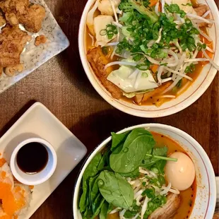 tofu vegetable ramen on top &amp; spicy tonkotsu ramen on bottom