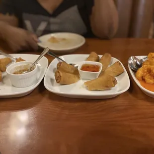 Fried tofu, spring rolls,  vegan cauliflower