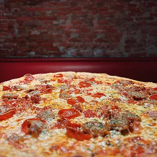 pepperoni, sausage, and cheese pizza