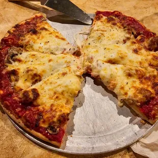 Medium with extra cheese, sausage, and mushroom