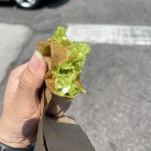 Chewy and has some coconut bit inside