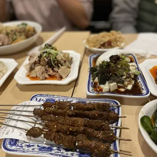 Lamb Skewers, Century Egg Tofu, Spiced Chicken with Chili Sauce