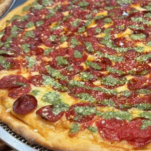 Pesto pepperoni pizza.