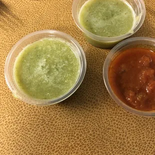 Spicy red sauce and the kicker green sauce
