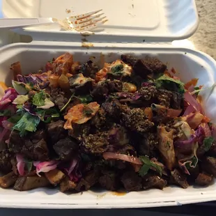 Kimchi fries with fajita steak. Unbelievably delicious! Get it!!