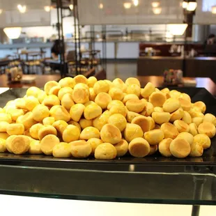 Corporate tea-time serving Pineapple tartlets, aka nastar.