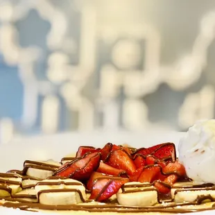 Crepe, banana and strawberry, topped with Nutella and vanilla gelato....