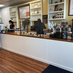 a woman standing at the counter