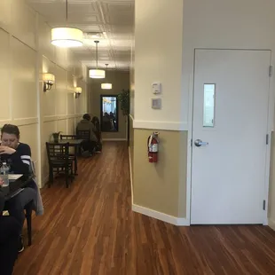 Tables and hall to bathrooms