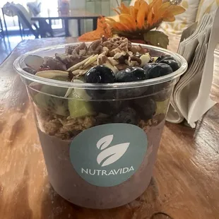 Açaí Bowl with bananas, strawberries, kiwi, walnuts, almonds, and chia seeds