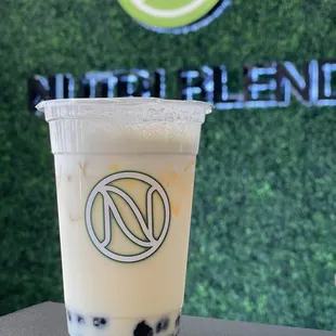 Passion Fruit Milk Tea w/ Tapioca Pearls