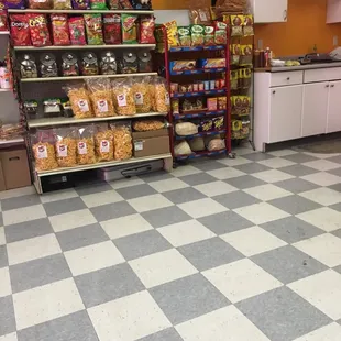 a grocery store with a checkered floor