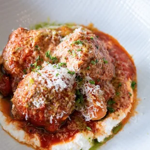 Roseda Farms beef meatballs with Sunday gravy, Grana Padano, and fresh focaccia