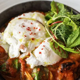 Shakshuka
Poached eggs, tomato, pepper, onion, pita