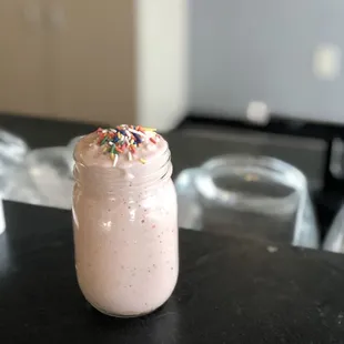 a smoothie with sprinkles on top