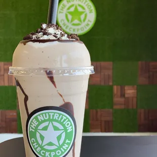 a milkshake with chocolate and whipped cream