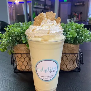 a smoothie with whipped cream on top