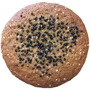 Sesame seed butter cookie. with toasted white sesame seeds and dark amber honey mixed in and topped w/ toasted black sesame. Newest addition