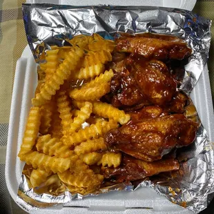 a meal in a styrofoam container