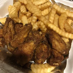 Cajun season . Mini wings- size of a freaking finger lol