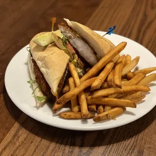 a plate of fries and a sandwich