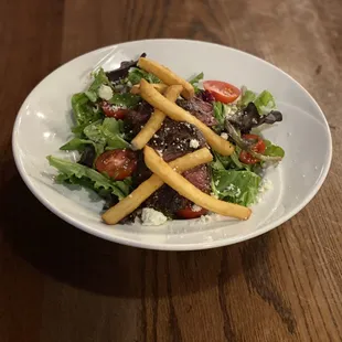 a salad with french fries