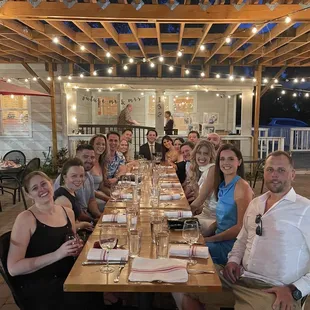Adorable pergola with market lighting!