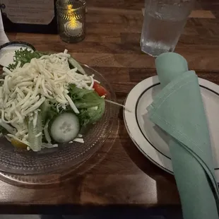 Side salad with homemade French dressing on the side