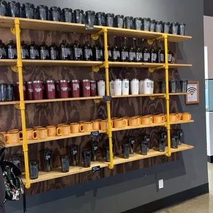 shelves of coffee and coffee mugs