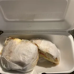 a sandwich in a styrofoam container