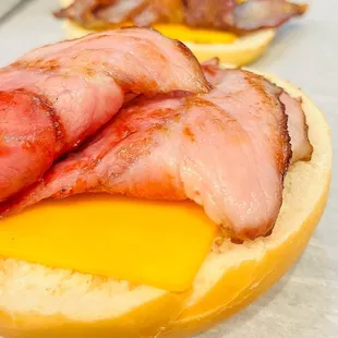 bacon and cheese on a bagel