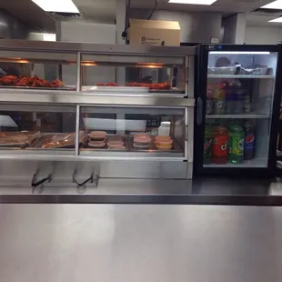 Chicken, bread and sides (greens, rice &amp; beans, mac &amp; cheese) hot case.