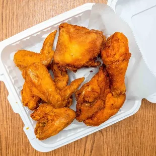 chicken wings in a styrofoam container