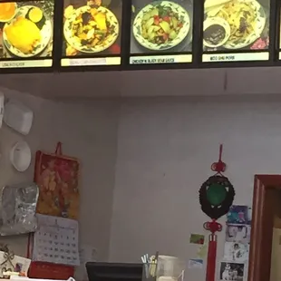 a restaurant counter and menus