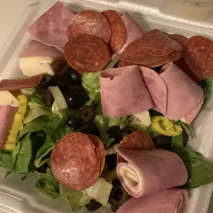 Hair in food and one slice of meat n cheese sliced with a lot of hard lettuce!