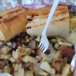 Bacon, egg, &amp; cheese on a hoagie roll with NY home fries