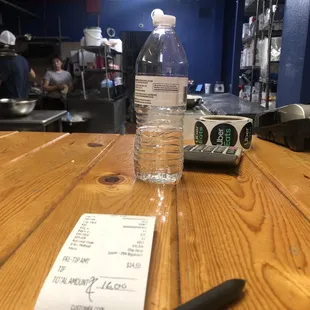 Both employees are not wearing masks or gloves