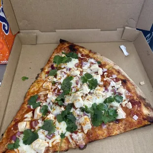 Two slices of giant pizza combo.