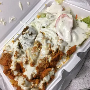 Chicken and falafel over rice with the white sauce - yum!