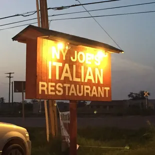 a sign for ny joe&apos;s italian restaurant
