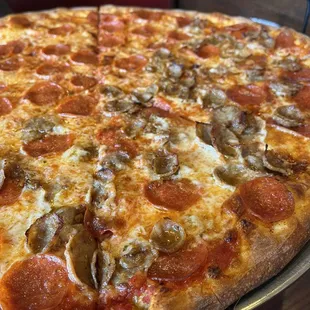 pepperoni, sausage, and cheese pizza
