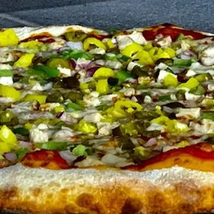 Chicken,Onion,green peppers,black olives banana peppers