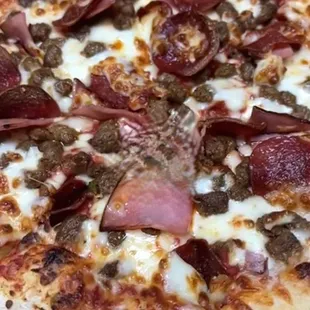 pepperoni, sausage, and cheese pizza