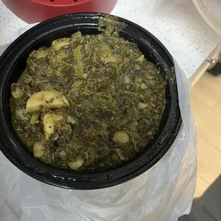 a person holding a bowl of food