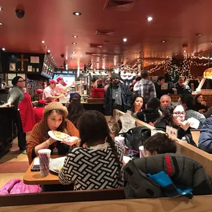 A non stop line of people eating pizza- that's NY!