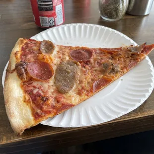 Slice of pepperoni and sausage.