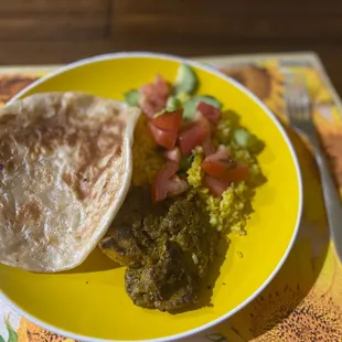 This is the chicken kebab with Greek salad and Malaysian paratha bread!