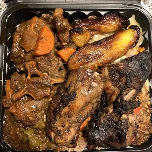 Oxtail and jerk chicken combo