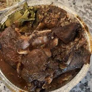 a plate of meat and vegetables